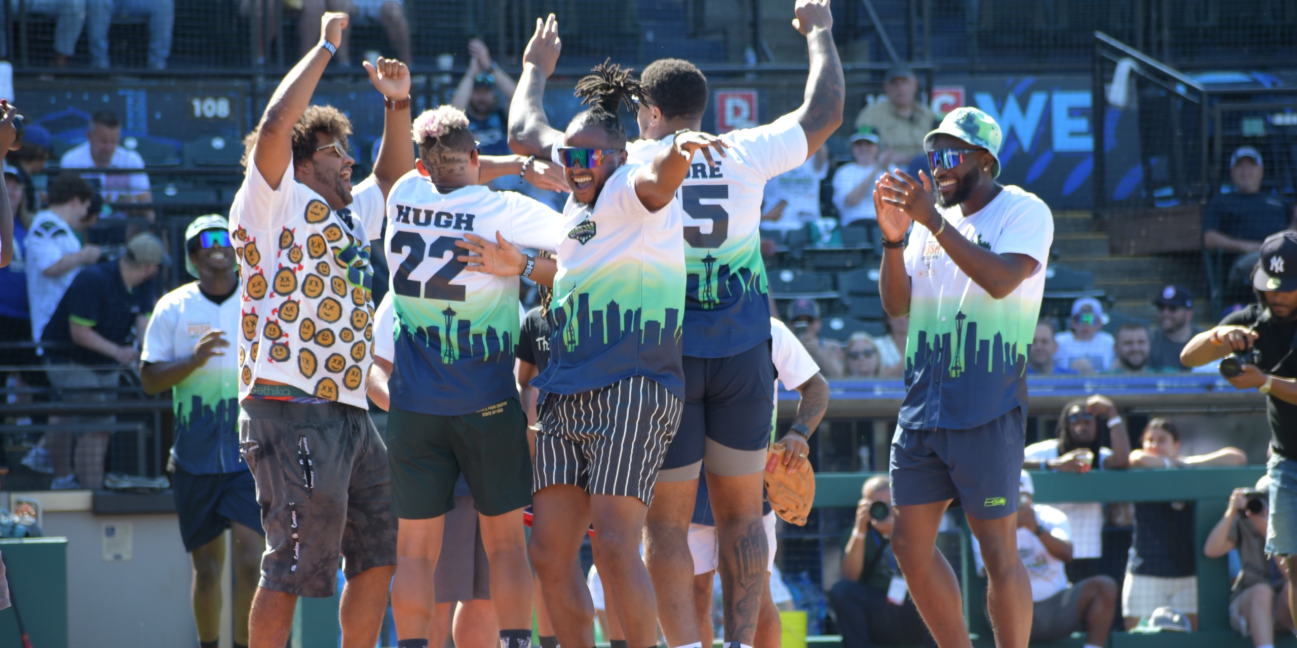 Players celebrating on the field at the Seattle All-Star Classic